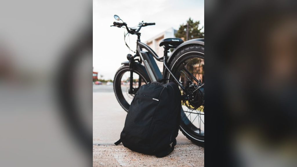 Bicycle and backpack on an urban street