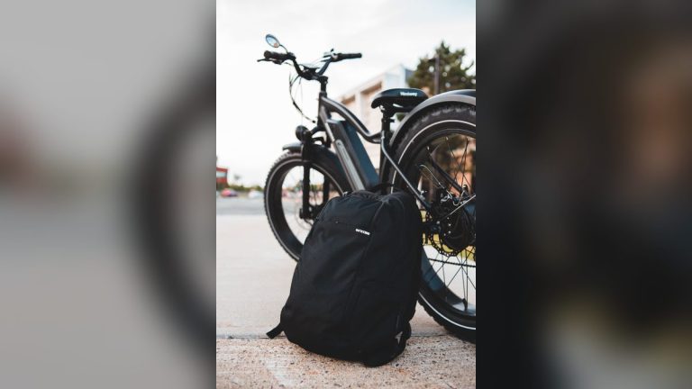 Bicycle and backpack on an urban street