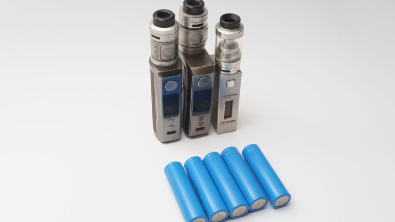 Blue 18650 lithium cells on a white surface