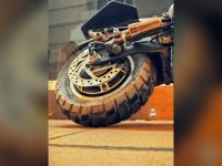 Close-up of an electric scooter's wheel and brake