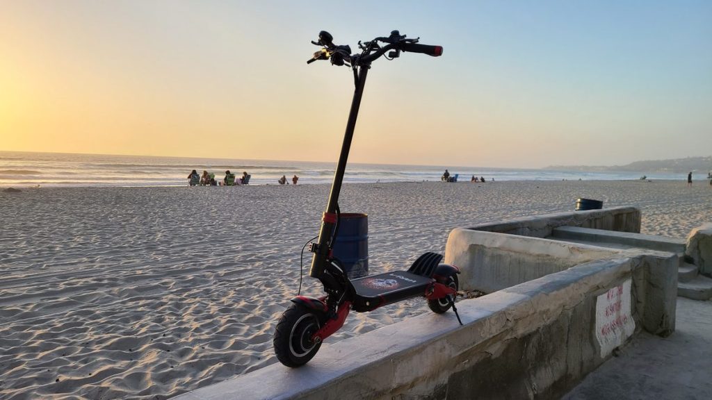 Electric scooter on a beach boardwalk