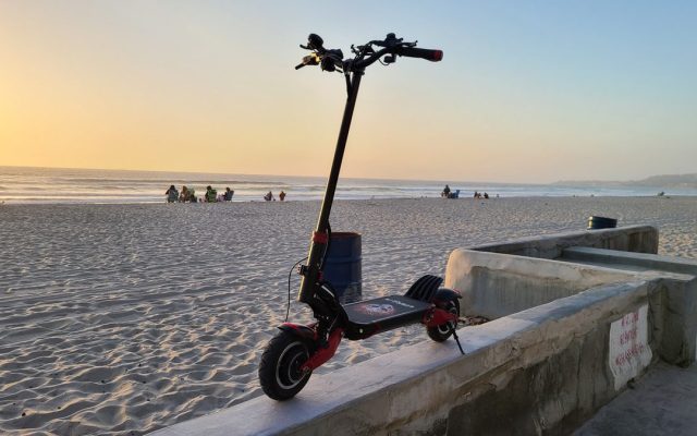 Electric scooter on a beach boardwalk