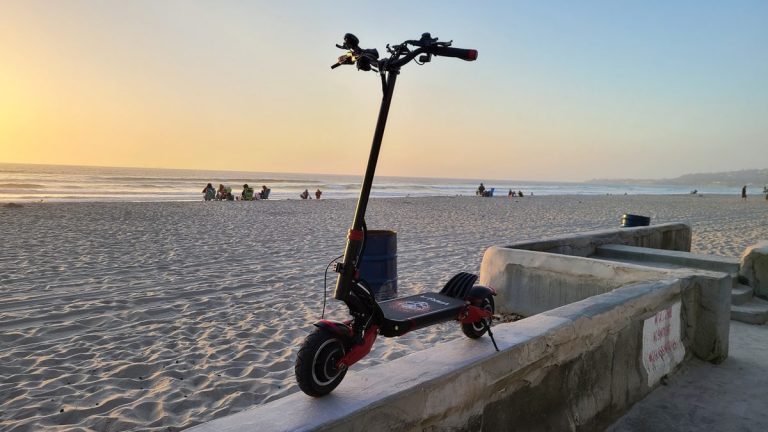 Electric scooter on a beach boardwalk