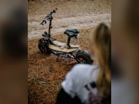 Electric scooter parked on a dirt path