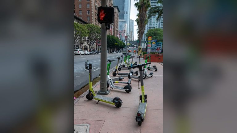 Electric scooters on a downtown Los Angeles sidewalk