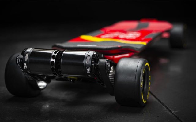Electric skateboard on a dark background