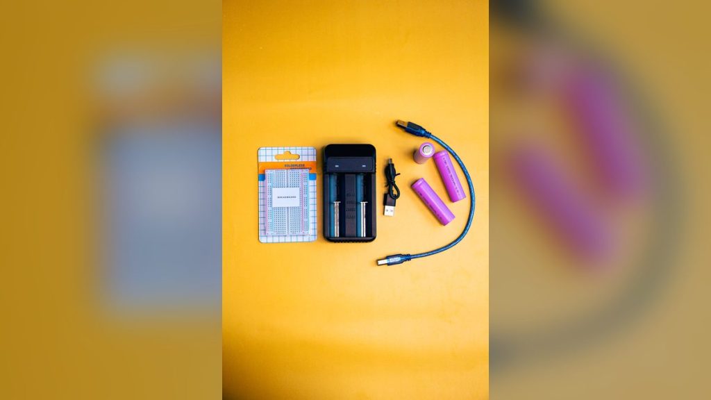 Electronics kit with charger, batteries and cables