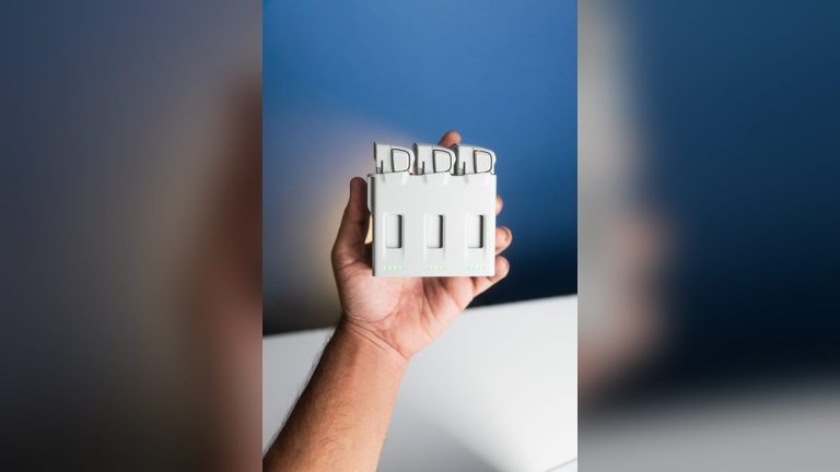Hand holding a battery charger