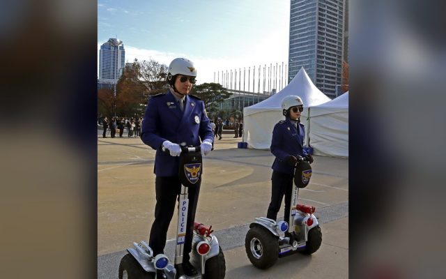 Police officer patrolling on a self-balancing scooter
