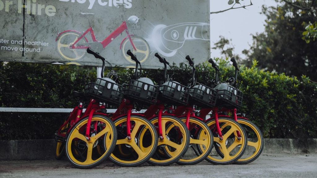 Red and yellow electric bikes for hire