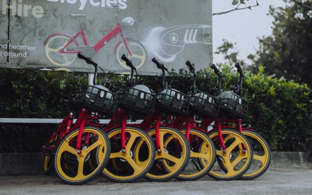 Red and yellow electric bikes for hire