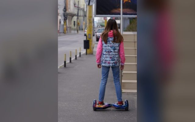 Rider on a hoverboard on a street