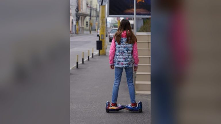 Rider on a hoverboard on a street