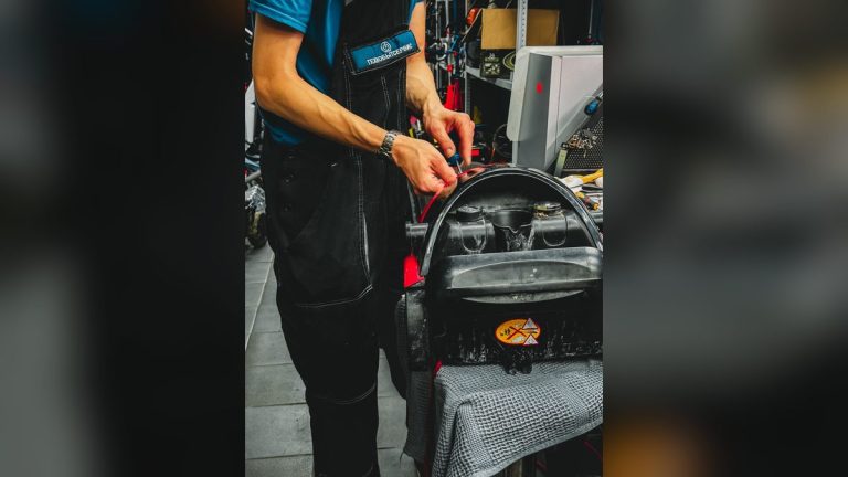 Technician repairing an electric unicycle