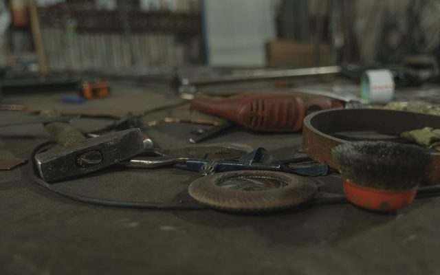 Tools scattered on a workbench