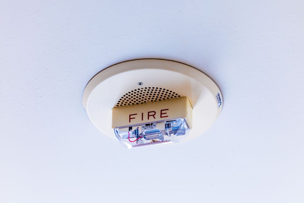 Close-up view of a ceiling-mounted fire alarm system ensuring safety in a building