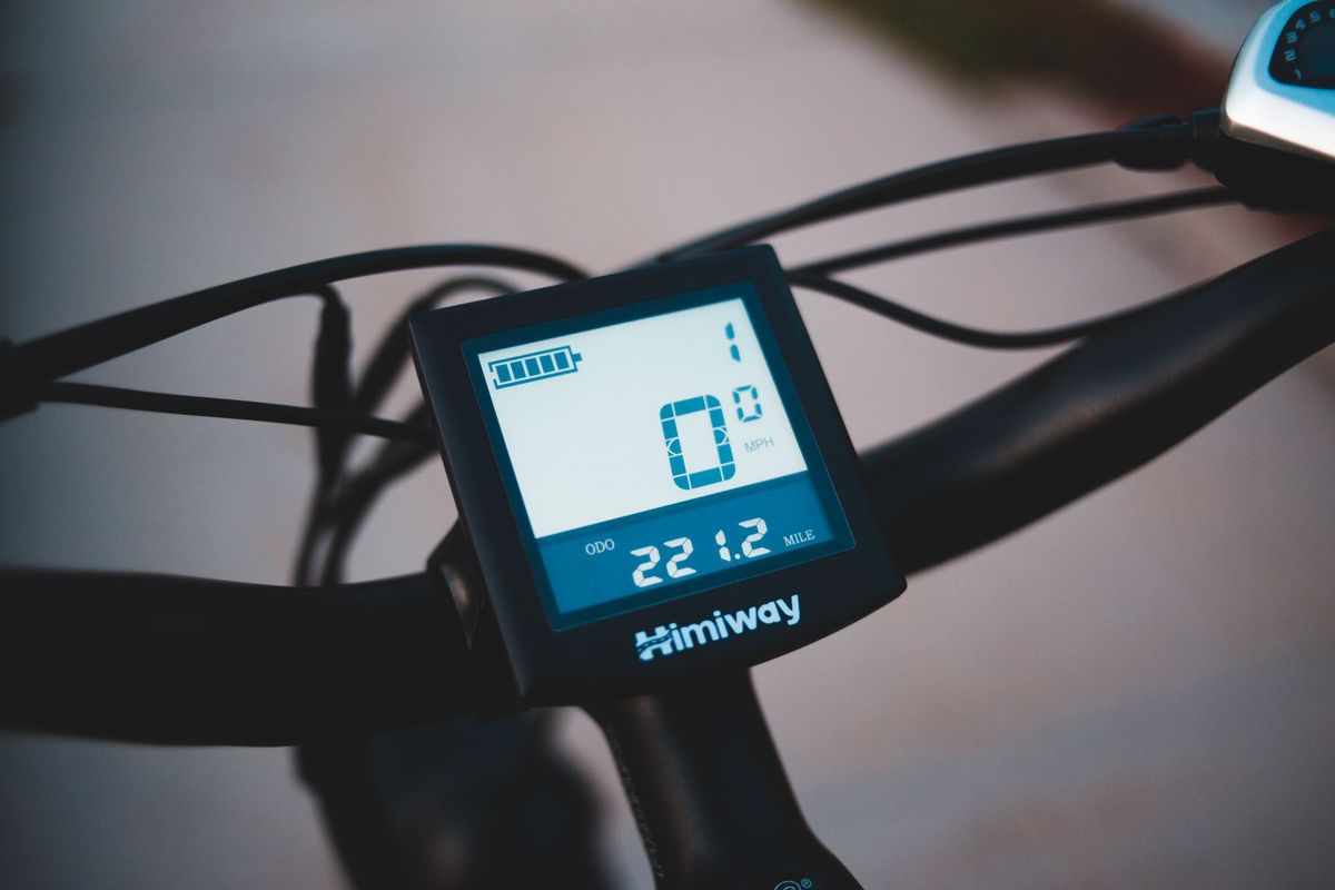 Detailed view of a Himiway bike speedometer showing battery and speed information