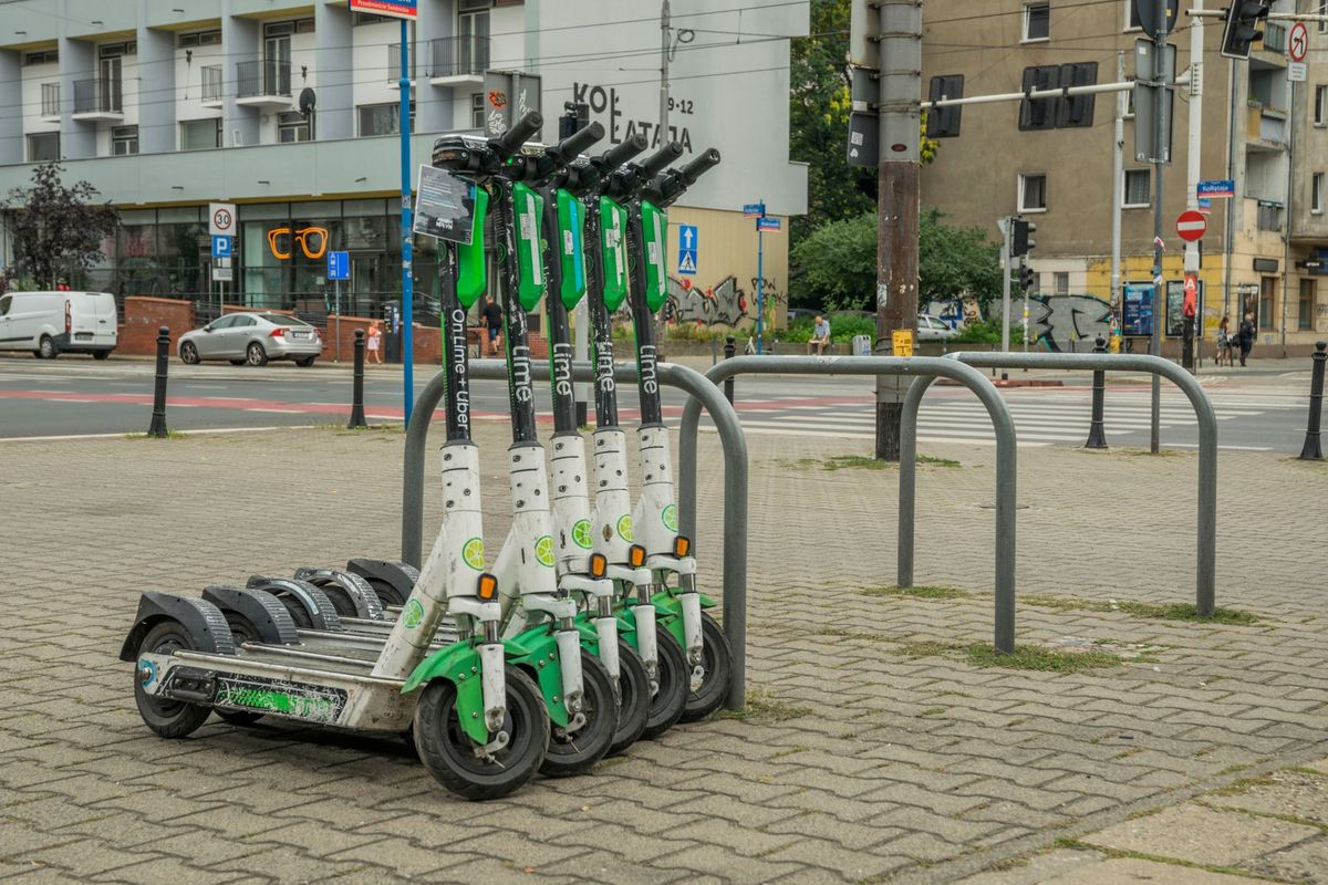 Lime electric scooters parked in Wrocław city center for urban transportation