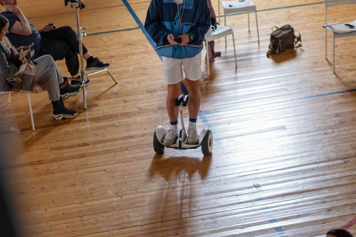 Man riding a self-balancing scooter